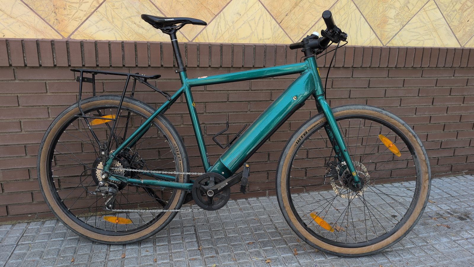Green electric bike for rent at Recyclo in Málaga