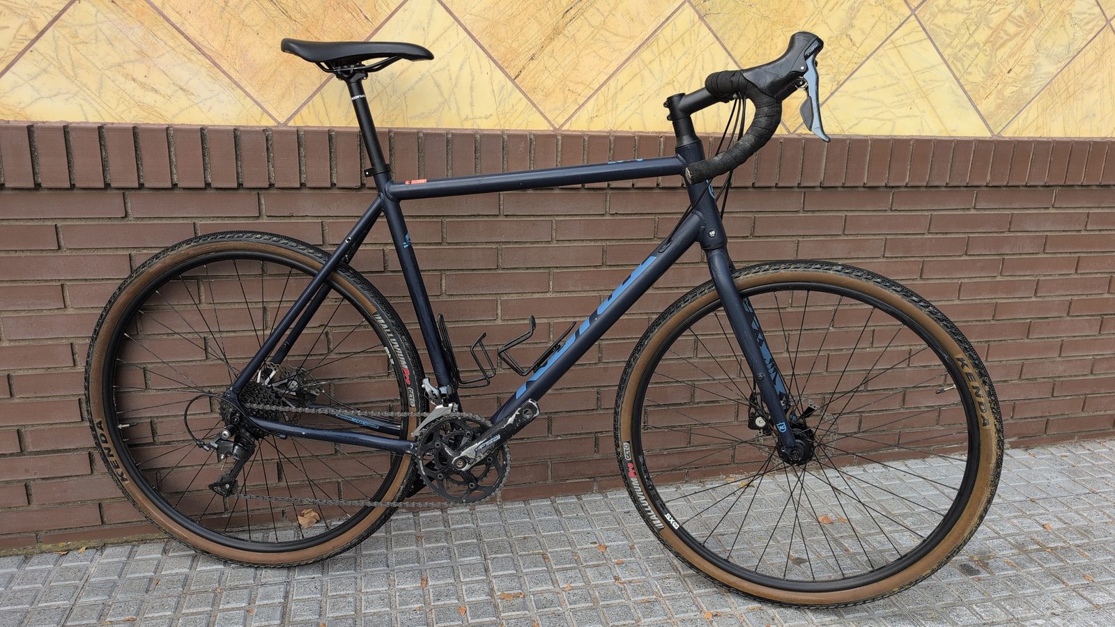 Navy Kona gravel bike, ex-rental, for sale at Recyclo in Málaga