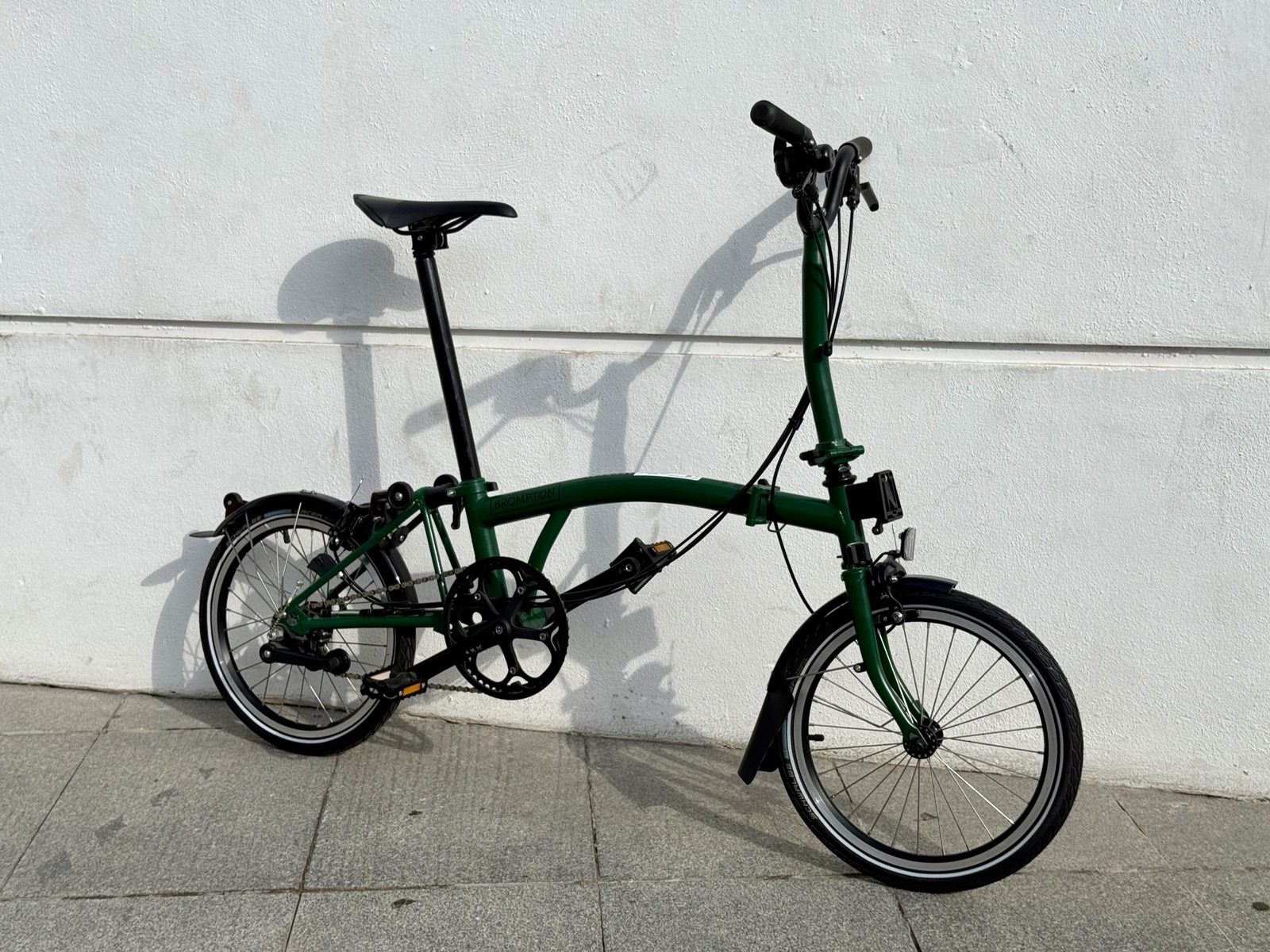 Green Brompton folding bike, new, for sale at Recyclo in Málaga